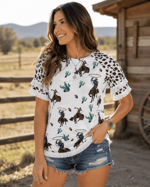 ILTEX Apparel Women's Clothing Rodeo Horse White Cheetah Tassel Tunic Top